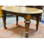 A Victorian mahogany oval dining table, bold legs, c.