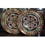 A pair of Royal Crown Derby 1128 pattern dinner plates,