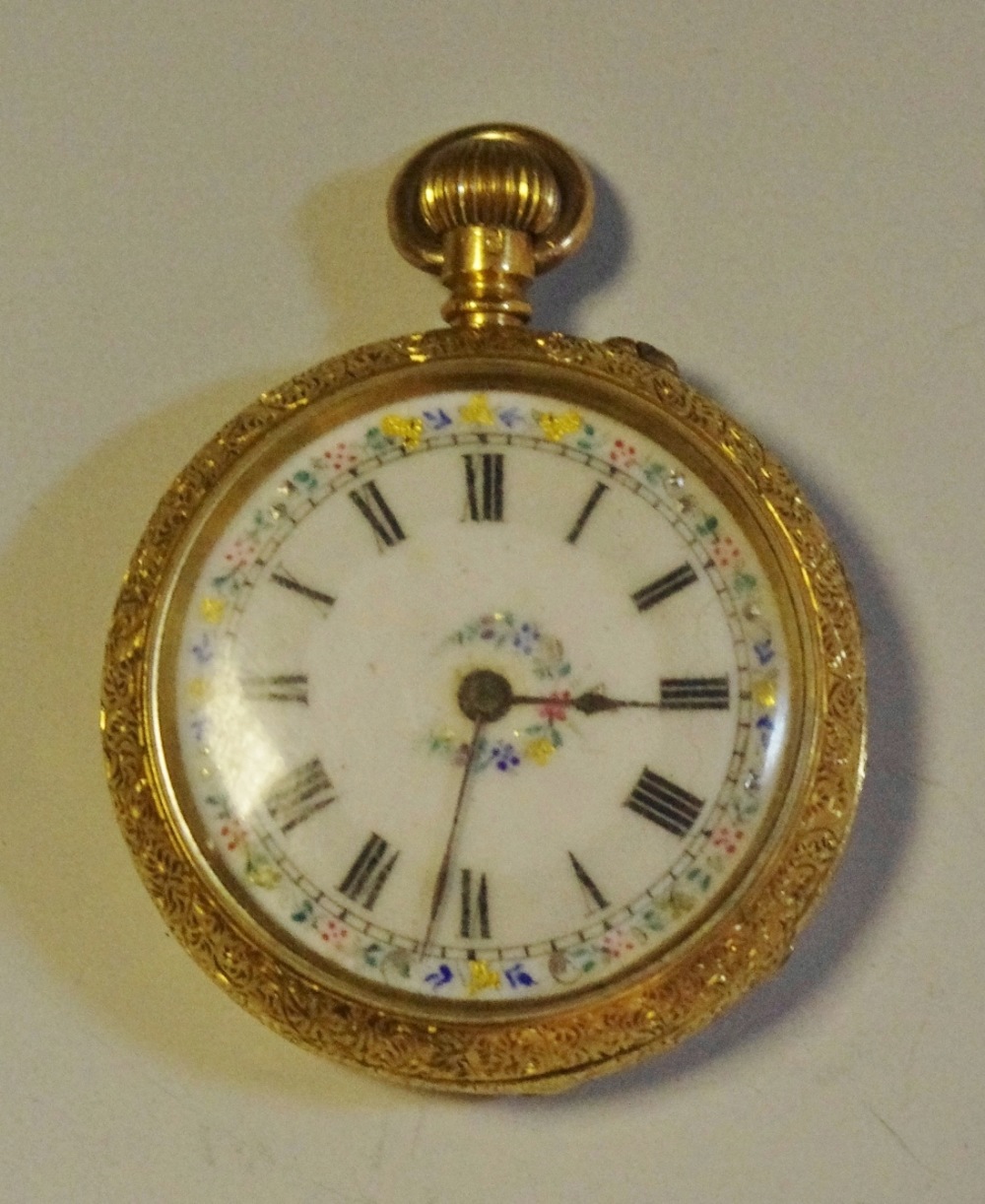 A lady's open face fob watch,