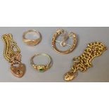 A 9ct rose gold horseshoe brooch; a 9ct gold ring; a 9ct gold chain; etc; 15.