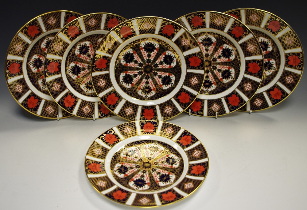 A set of six Royal Crown Derby 1128 pattern dessert plates,