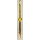 A lady's Marvin 9ct gold watch, integral 9ct gold bracelet strap, marked 375, 11.