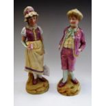A pair of Victorian biscuit figures, as a young boy and girl, approx 31.