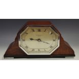 A mahogany mantel clock, octagonal dial, G. Hewitt and Son, Grimsby, 12.