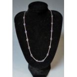 A contemporary modern design deep blue black stone inset white gold necklace,