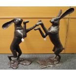 PJ Mene, after, Boxing Hares, a pair, bronzed metal sculptures,