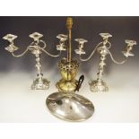 A pair of silver plated candelabra,