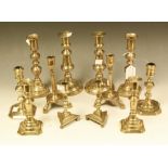 A pair of 19th century brass ejector candlesticks;