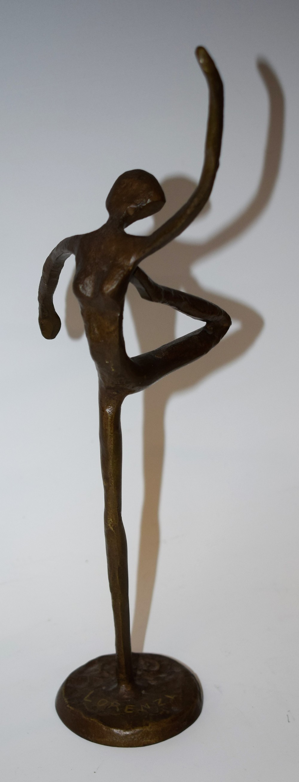 A Hagenauer style bronze figure, Dancing Girl, moulded base, later marked Lorenzl,