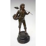 A Victorian spelter figure, as a boy with a basket of fruit, titled to mount Au Pressoir,