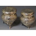 A near pair of Asian white metal jars and covers, 10.