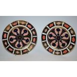 A pair of Royal Crown Derby 1128 pattern tea plates,