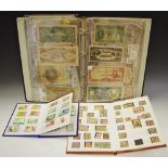 A folio of old paper money; 2 stamp folios,