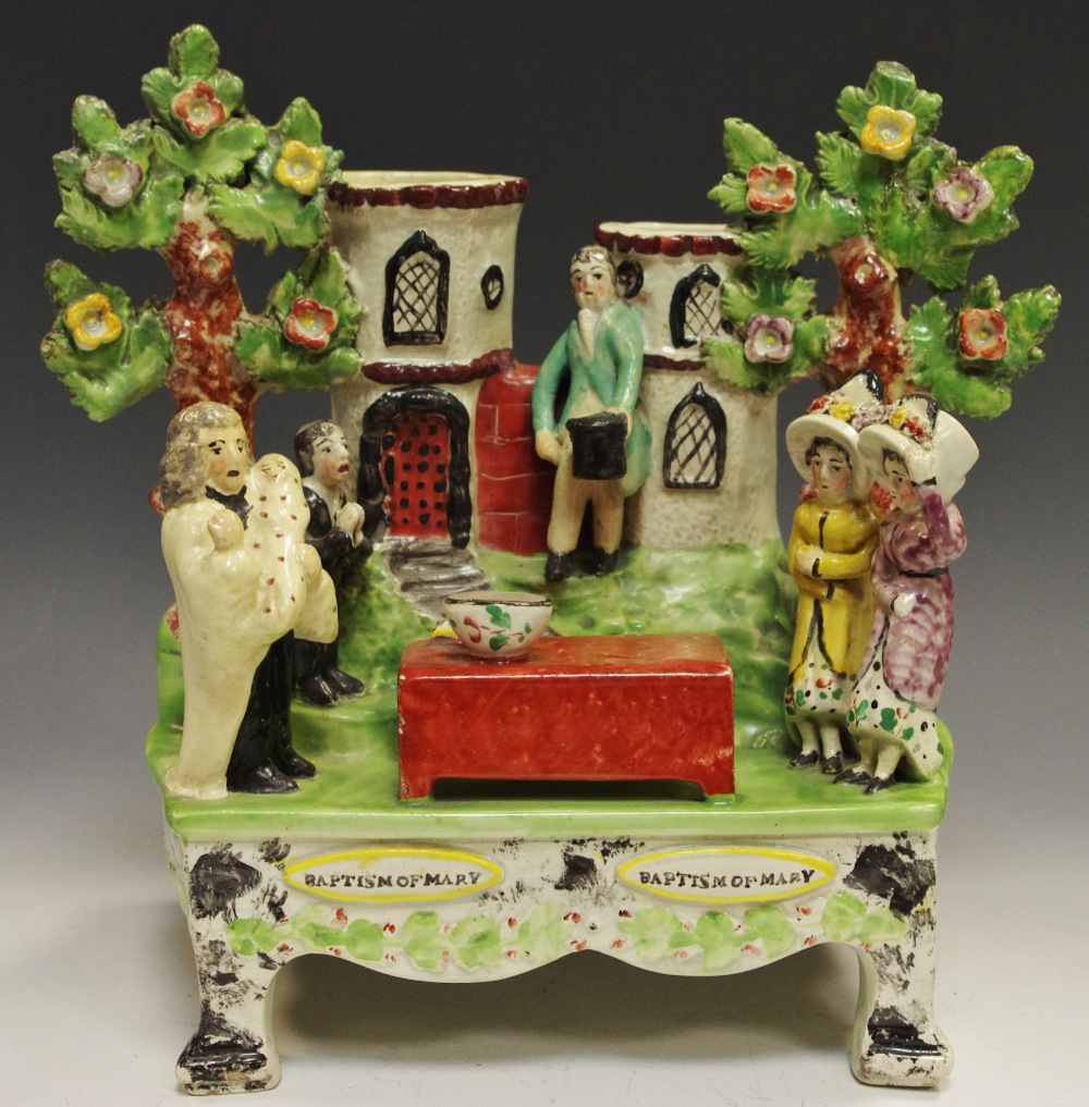 A Staffordshire figural group, Baptism of Mary, in the manner of Obadiah Sherratt,