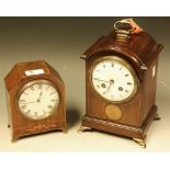 An Edwardian mahogany inlaid mantel clock, brass loop handle, arched case,