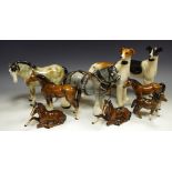 A Beswick pony; a Beswick foal laying down; a Melba shire horse; other horses;