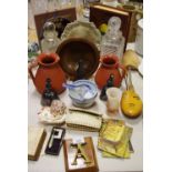 A Victorian desk clip with "A"; a small turned wooden bowl; shells; shoe lasts;