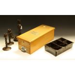 An early 20th century cash box with bell; a Bakelite table lamp with ashtray; a cash tray;