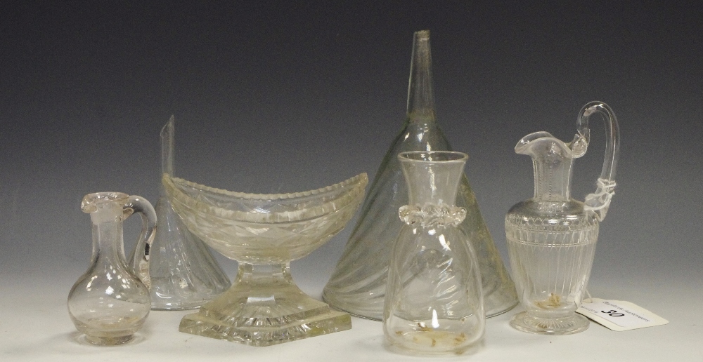 Glass - a 19th century clear funnel, 10cm diam; another, smaller, 6.