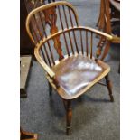 A yew and elm spindle back Windsor chair, shaped pierced splat, saddle sear,