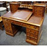 A Victorian mahogany pedestal desk, spindle back gallery and shelf,