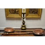A Victorian copper bed warming pan with chased decoration of a fanciful bird; another similar;
