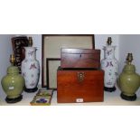 A pair of Chinese baluster table lamps; another pair of lamps; a workbox;