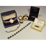 A 9ct gold lady's wristwatch; a silver baby pin; a Victorian seed pearl and garnet ring etc.