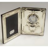 An Elizabeth II silver combination boudoir clock and photograph frame, Carrs, Sheffield 1996,