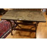 An early 20th century work table, rectangular top, cast metal base, 117.