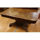 A George/William IV rosewood library table, rounded rectangular top above a frieze drawer,