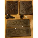 Treen - a pair of rectangular carved oak panels, each carved with central diamond lozenge,
