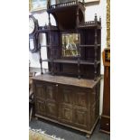 An oak mirror back sideboard, mirrors and shelving to top,