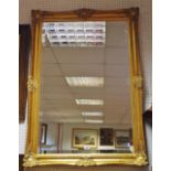 A decorative gilded mirror