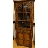 A Titchmarsh & Goodwin type free standing corner cupboard, antiqued oak,