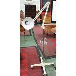 A floor standing angle poise type lamp