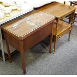 A reproduction mahogany occasional table with draw slide above under gallery holding one long