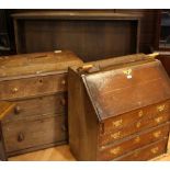 An oak open bookcase; A George III mahogany crossbanded oak chest of drawers, c.