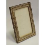 A George V silver rectangular easel photograph frame,