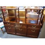 A contemporary mahogany sideboard, rectangular top above three drawers,