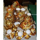 A Marquis Fine China Waggon Days pattern dinner and tea set comprising tea pot,