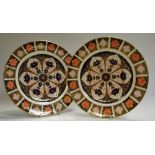 A pair of Royal Crown Derby 1128 pattern dinner plates