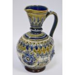 A Doulton Lambeth globular jug, incised and applied with floral roundels,