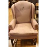 A George III design wingback reception armchair, scroll arm,