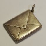 An Edwardian silver novelty stamp case, as an envelope, Grey & Co,