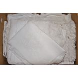 Textiles - white cotton and linen table cloths,