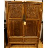 A contemporary Chinese camphor side cabinet,