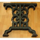 A pair of cast iron table ends,