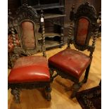 A pair of Carolean Revival oak hall chairs (2)