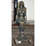 A reproduction cast metal figure,